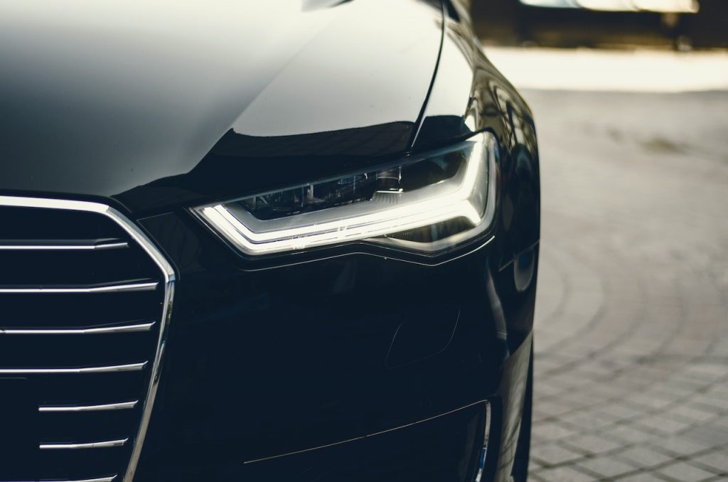 Close up picture of a Helmet PPF fully wrapped black car